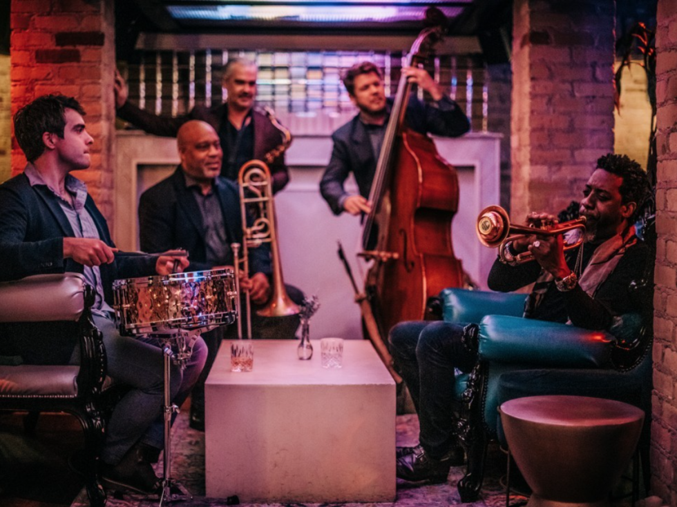 A jazz quintet plays at Devil May Care