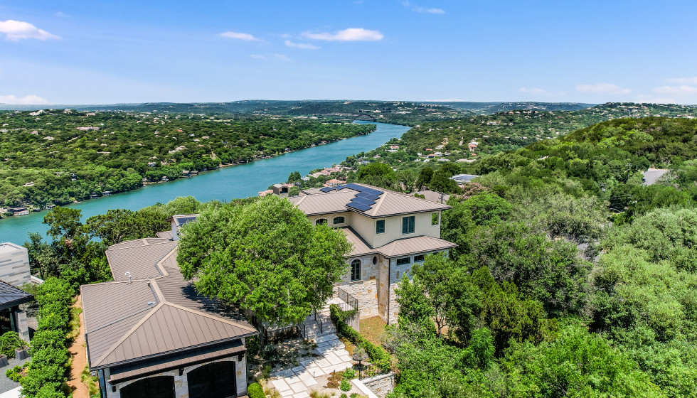 Magical views surround this custom-built hilltop Austin home