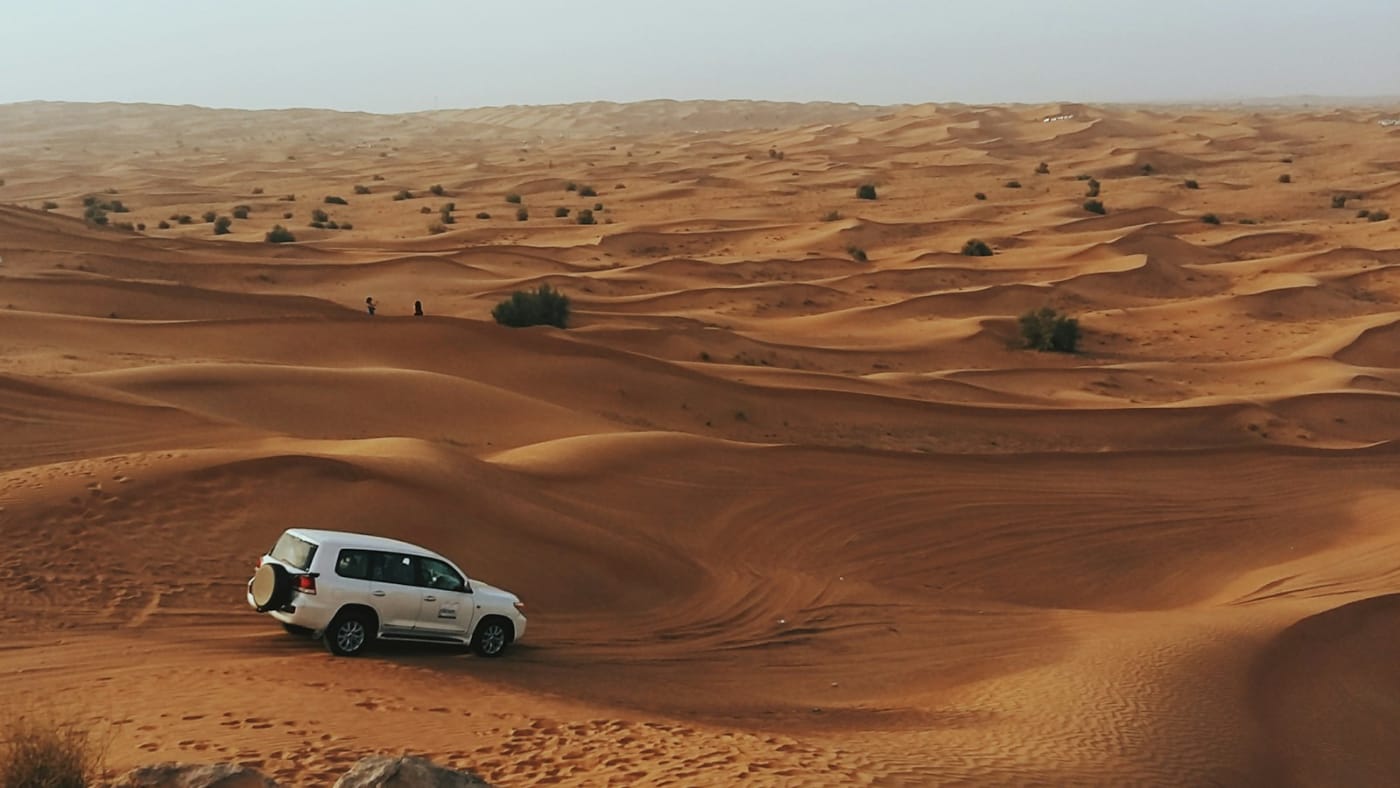 A 4x4 on the dunes of the Arabian Desert outside Dubai