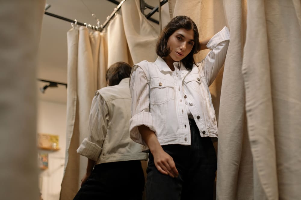 Woman trying on clothes in store