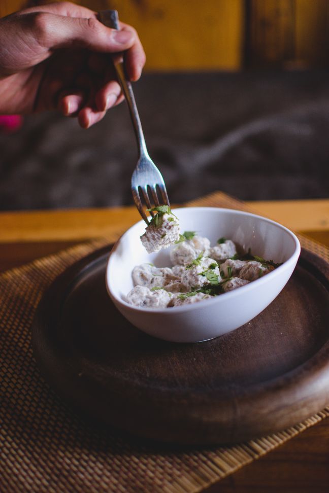 An interesting dish from Ladakh - dumplings with walnut and apricot kernel sauce.