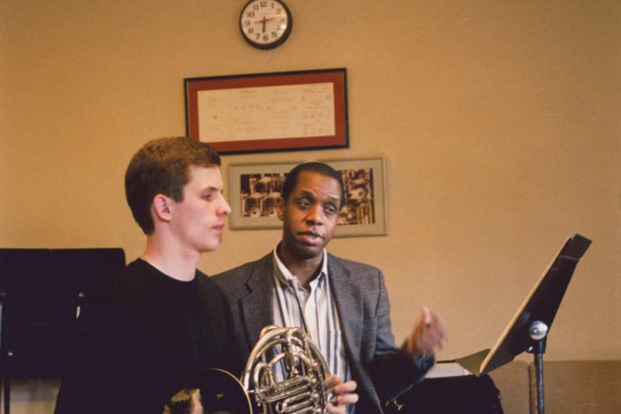 Jerome Ashby giving a horn lesson