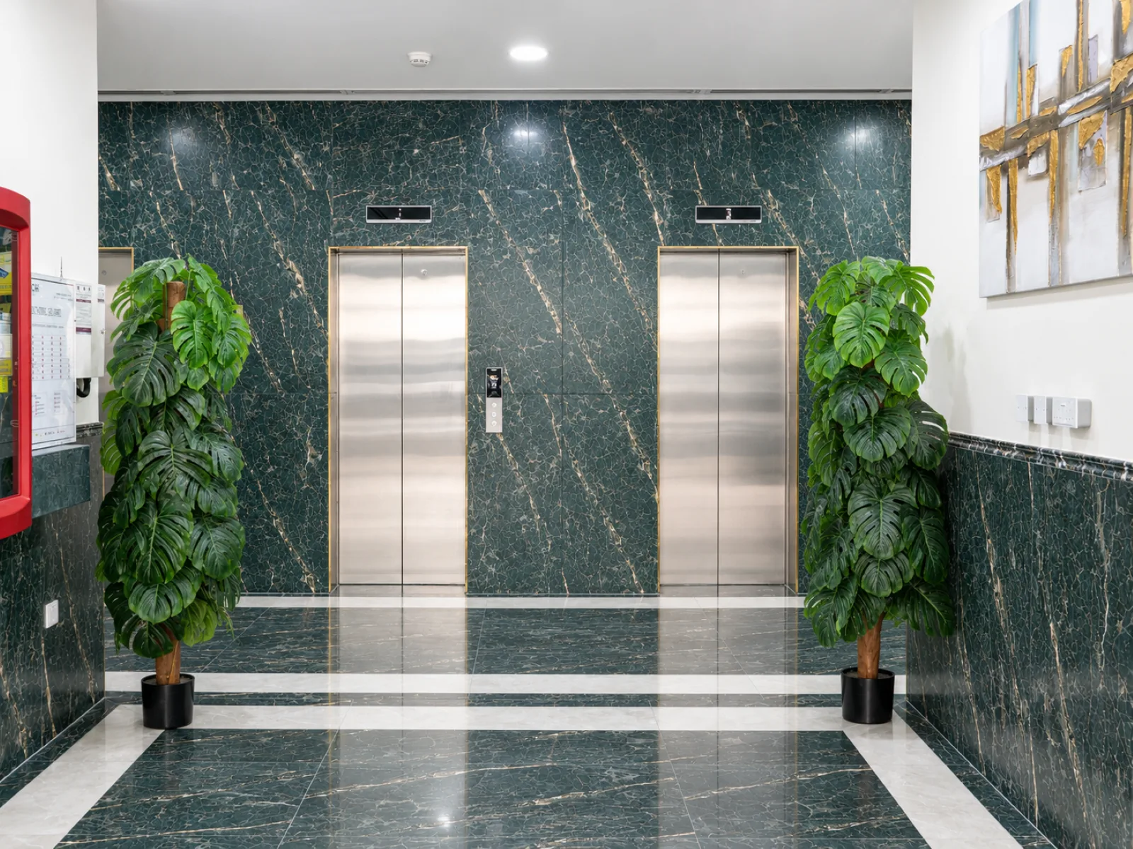 Symmetrical Green Marble Elevator Lobby