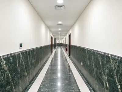 Symmetrical Green Marble Corridor