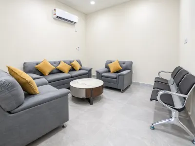 Modern Minimalist Lounge with Mustard Accents