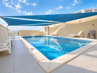 Sunny Rooftop Pool Retreat