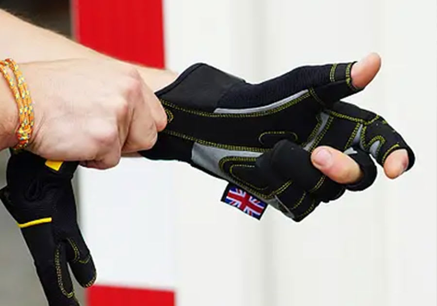 Putting on a fingerless Dirty Rigger work glove