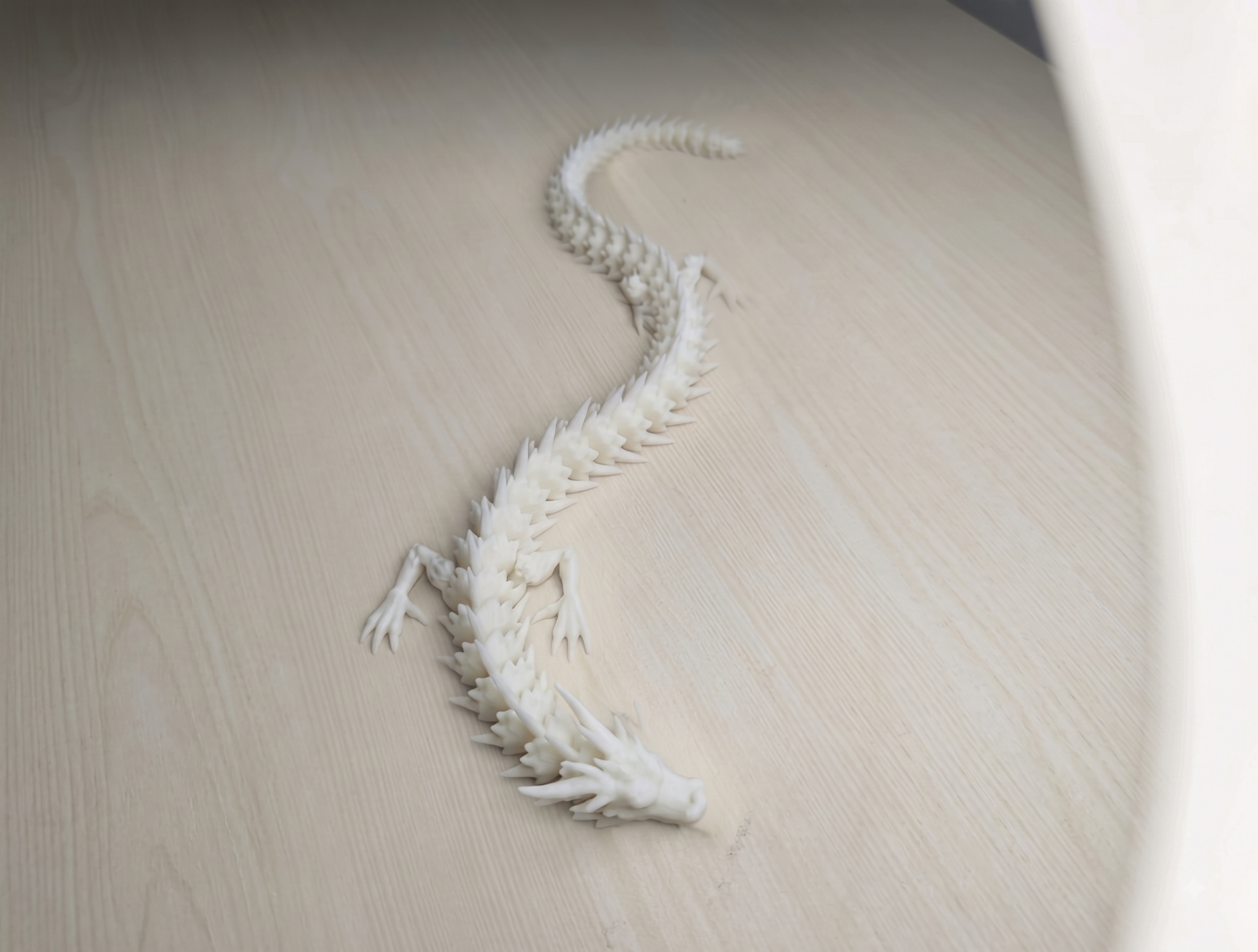 3D Printed Articulated Crystal Flexi-Dragon made from Pure White PLA - Buy online in India