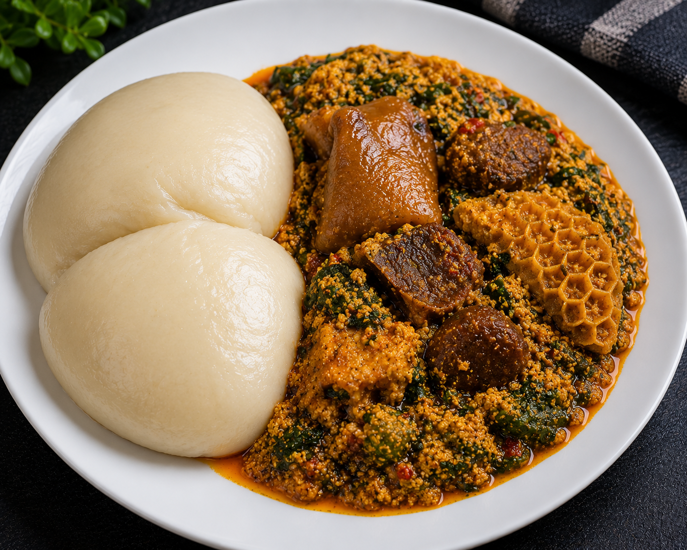 Pounded yam and Egusi with Assorted