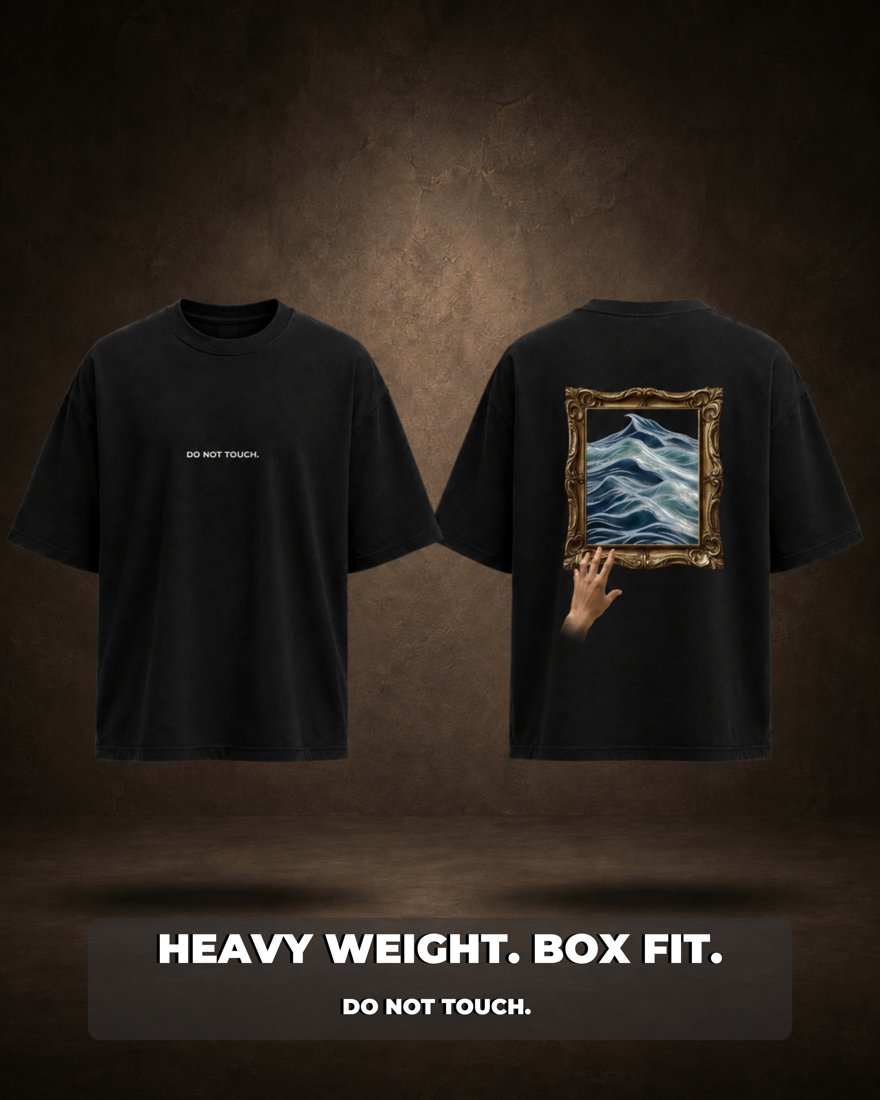 Back artwork printed on a black oversized Do Not Touch T-shirt