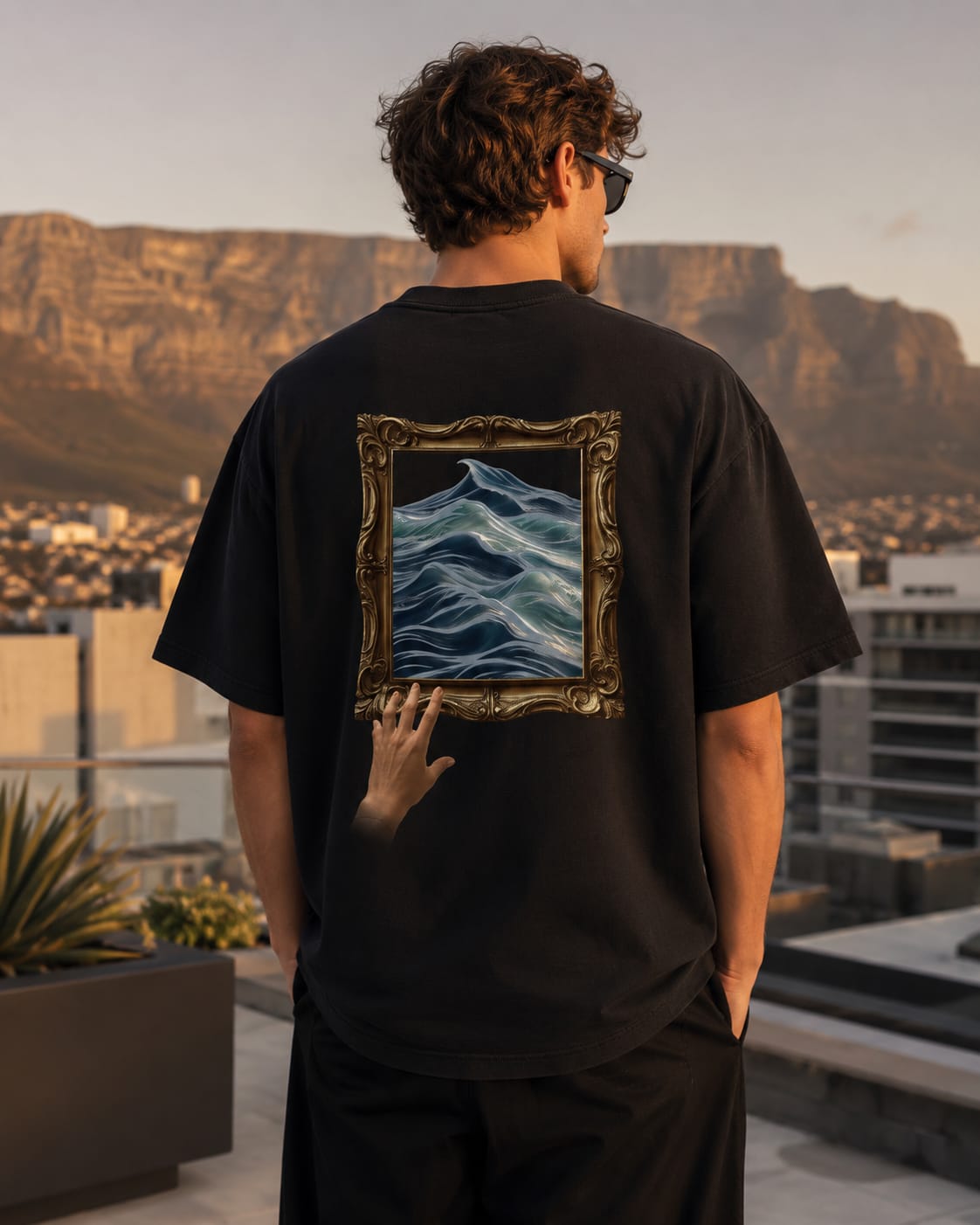 Ocean design on a black oversized Do Not Touch T-shirt