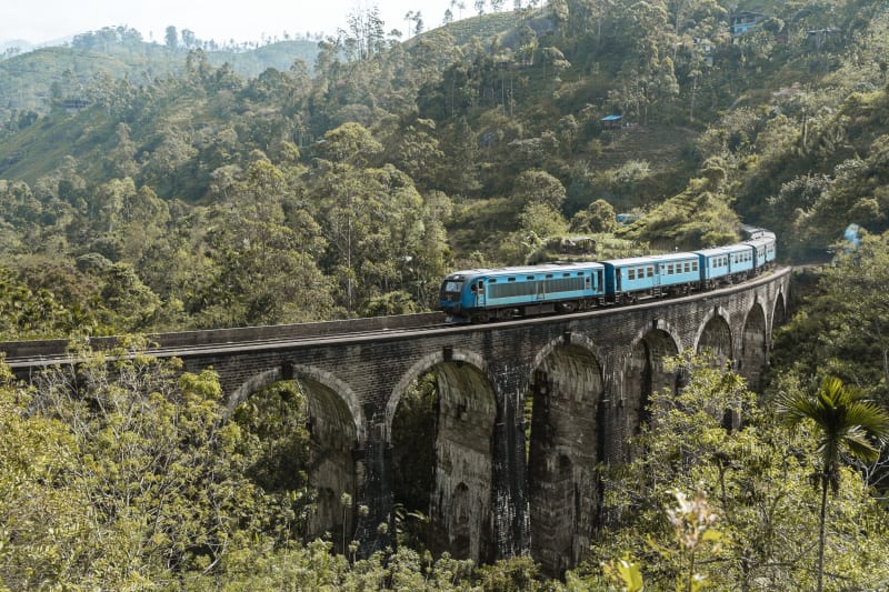 Ella Nine Arch Bridge Blue Train