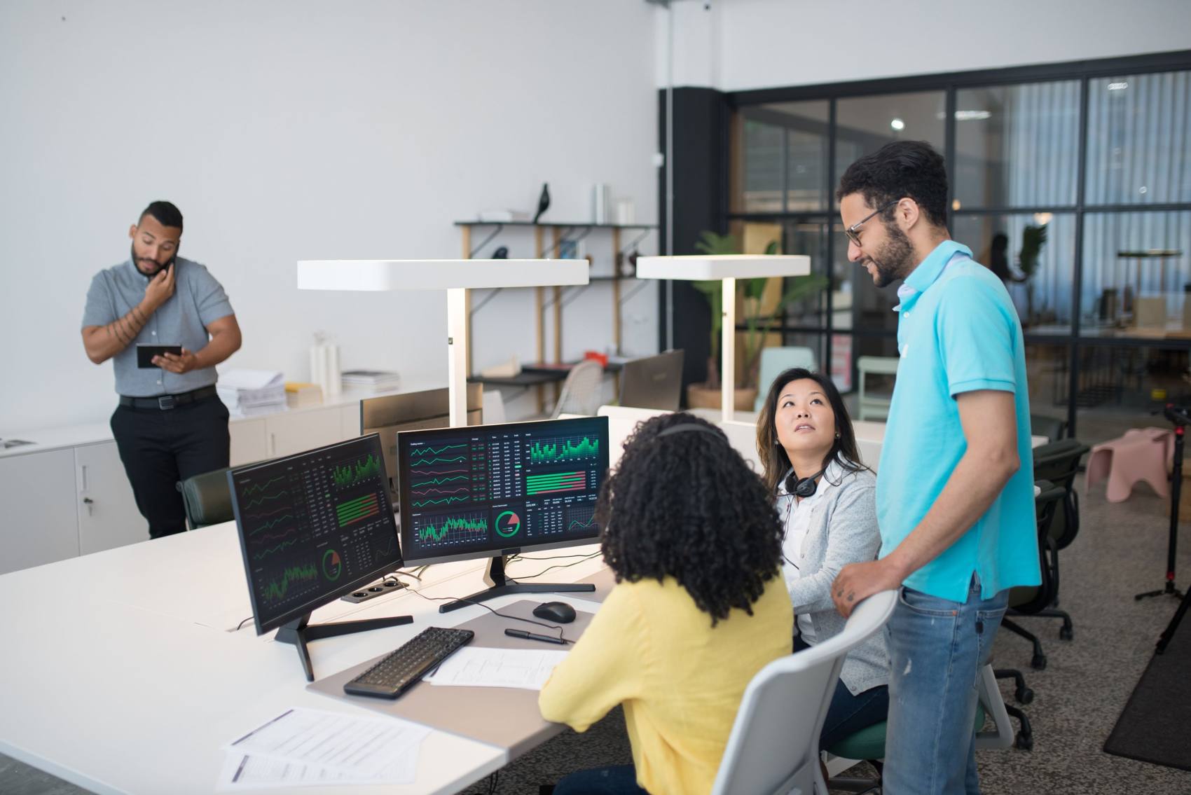 Team reviewing analytics dashboards together