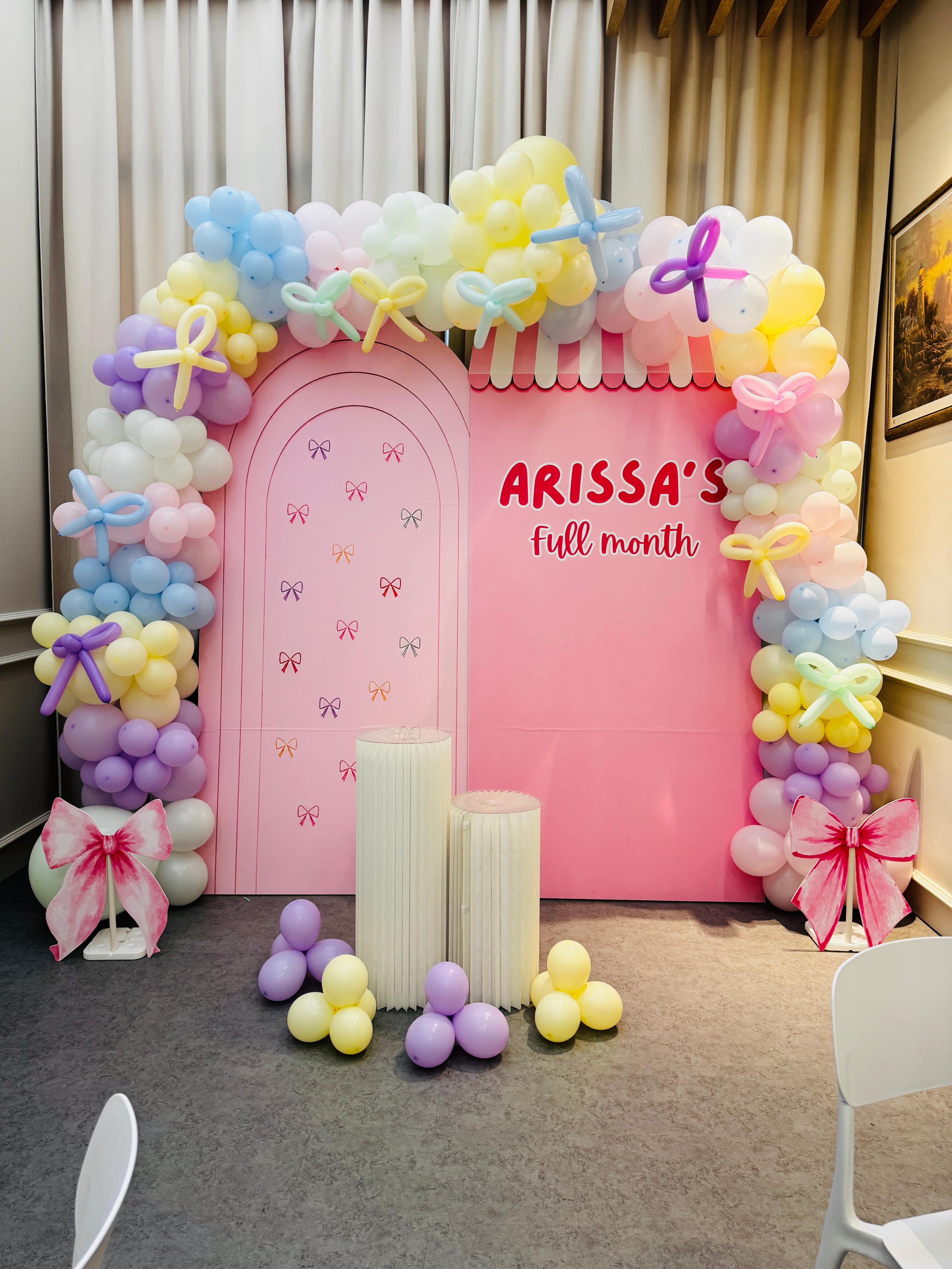 Pastel first birthday balloon decoration