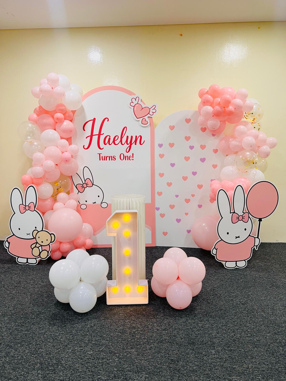 First birthday balloon decoration with personalised backdrop