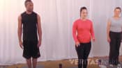 Three people doing a scissor hamstring stretch.