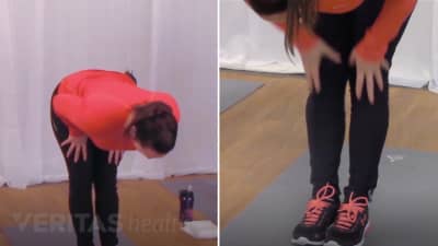 Woman doing the hamstring stretch for low back pain