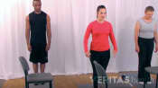 Three people doing a standing hamstring stretch.