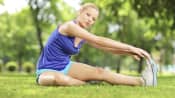 Woman stretching in the park.