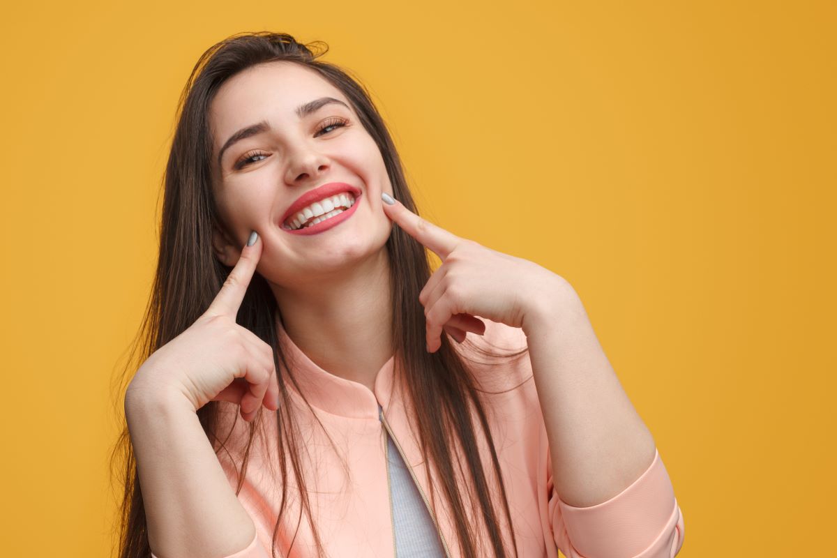 Will Cosmetic Gum Contouring Expose the Sensitive Dentin Layer of My Front Teeth?