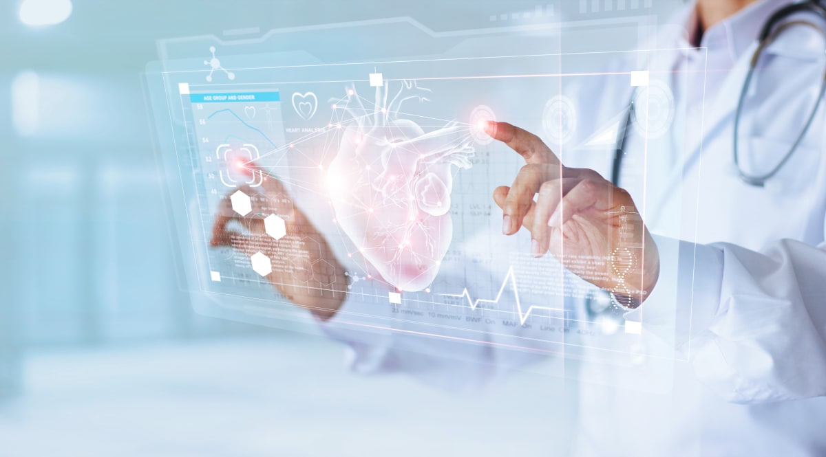 Consultant cardiologist in London reviewing a patient's heart test results in clinic
