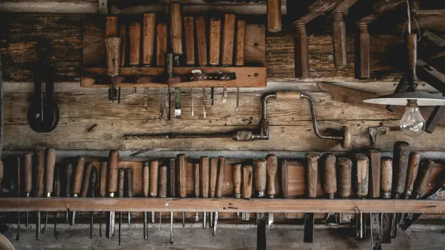 Woodworking tools hanging on a wall