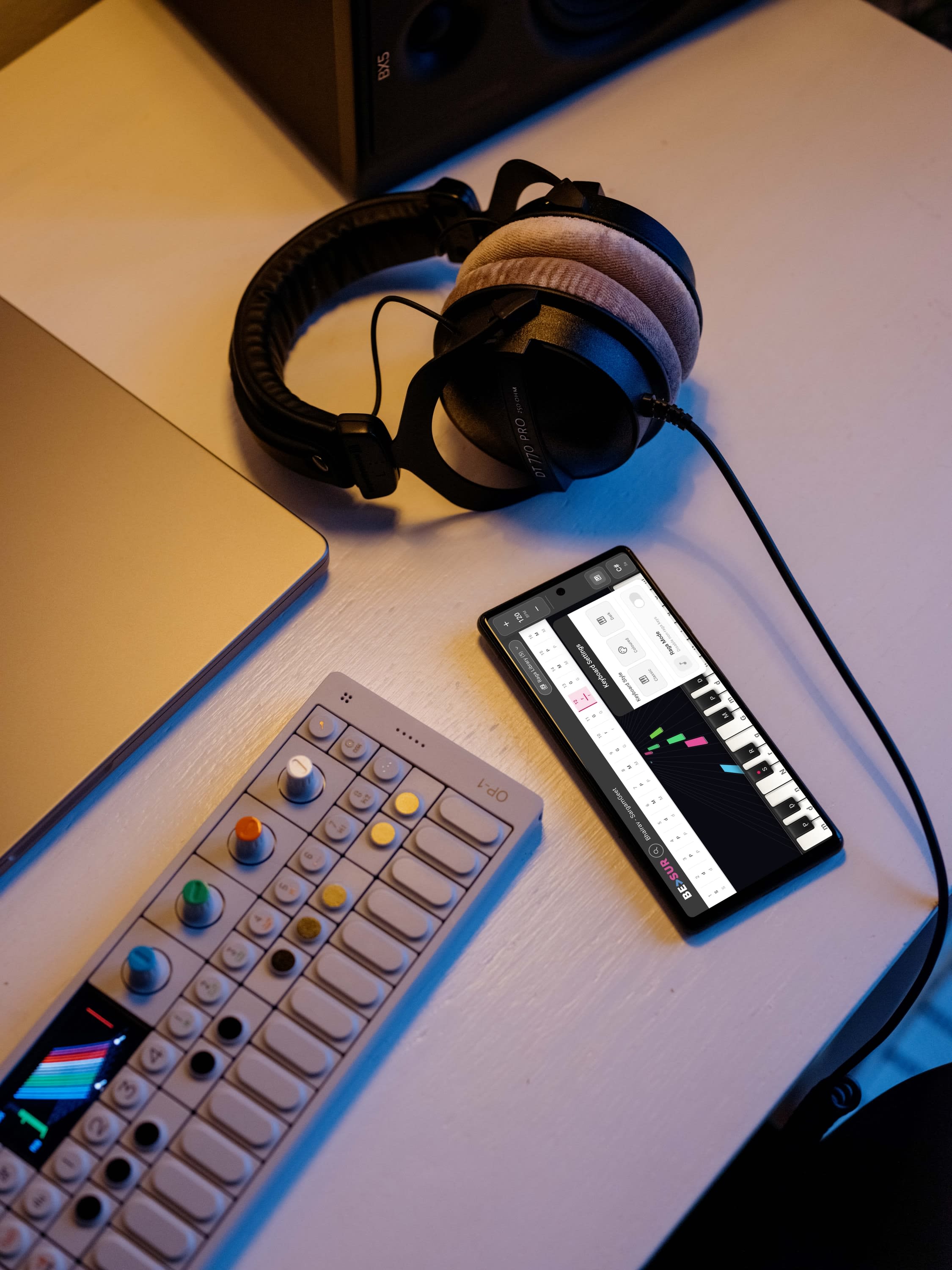 beSur on Android phone at music production desk