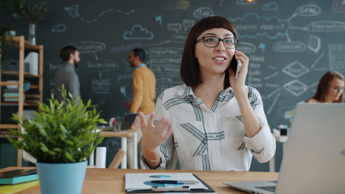 Business owner on a phone call in a professional office environment