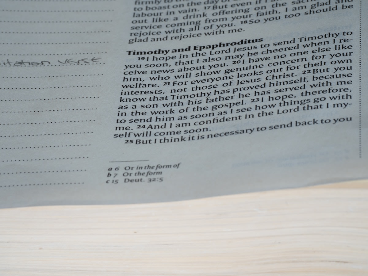 Business professional reviewing conversation notes for personalised follow-up message