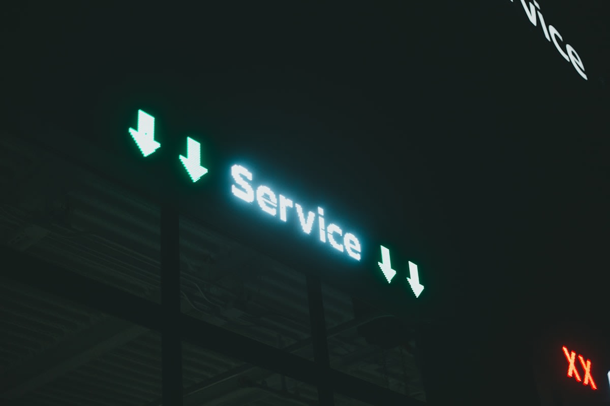Service business owner reviewing accounts, unaware of the revenue lost to missed and unanswered enquiries