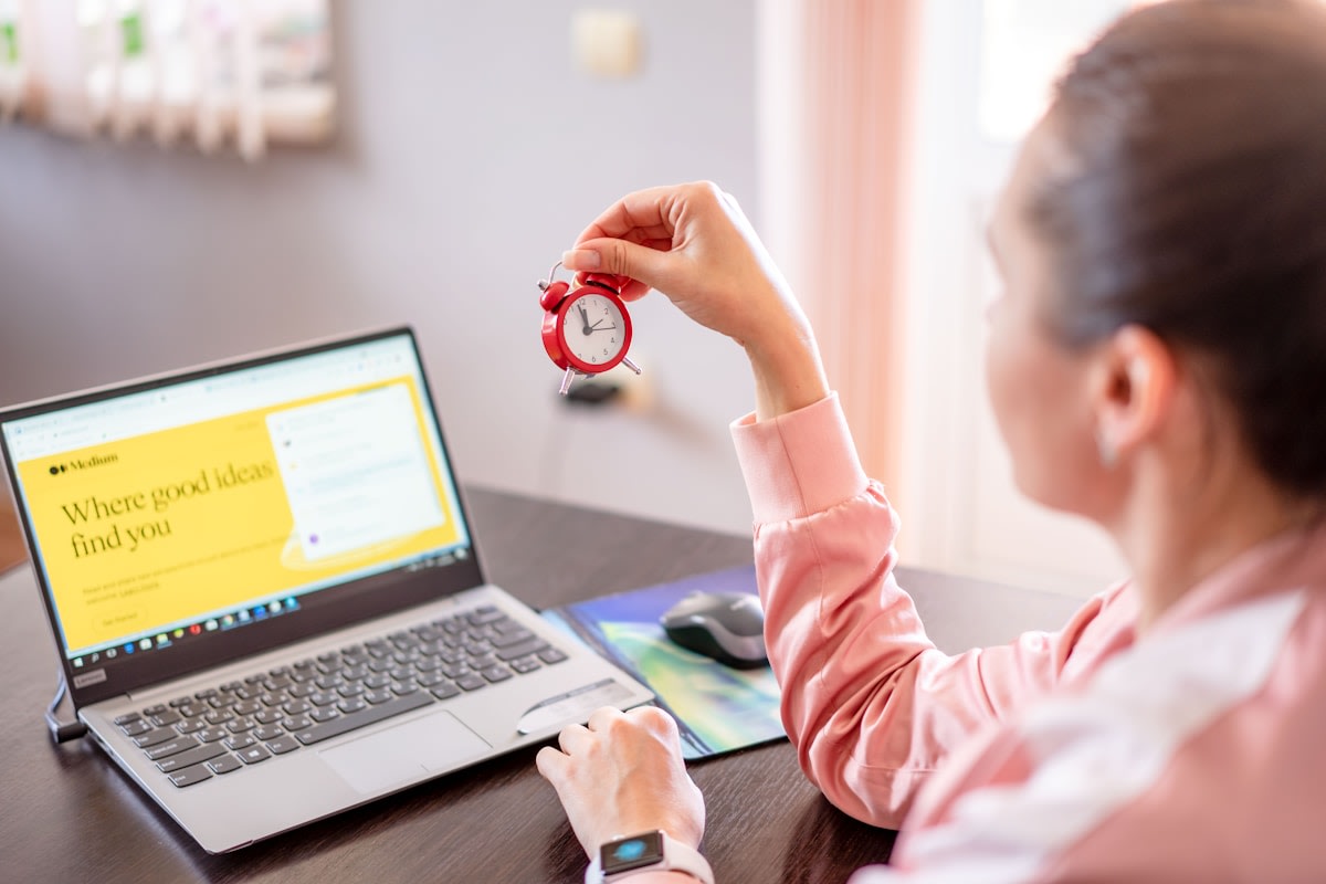 Laptop and smartphone showing automated messaging workflows for a small business