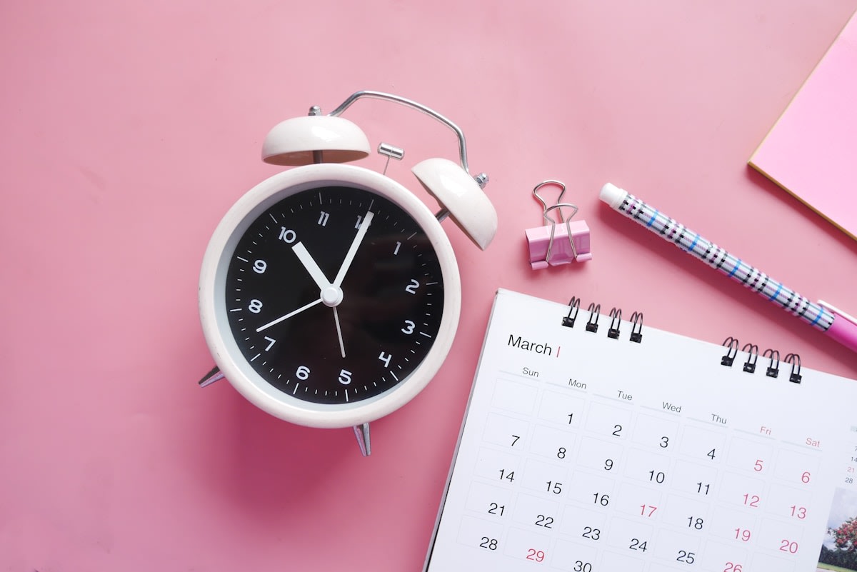 Calendar and phone showing a last-minute reschedule message for a service appointment