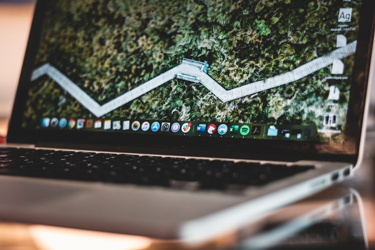 Business owner reviewing CRM pipeline data on a laptop, unaware of leads missing from the system