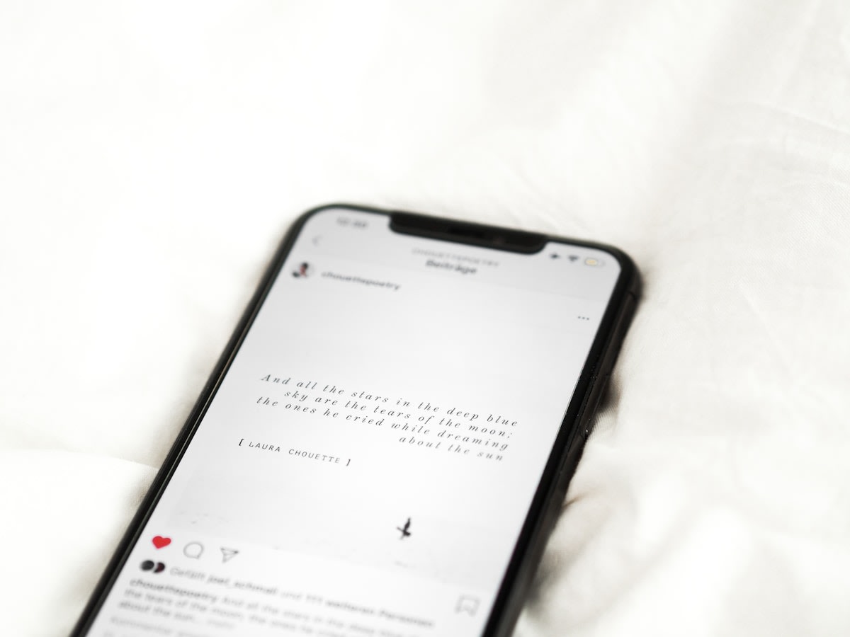 Service business owner booking appointments via WhatsApp on a mobile phone
