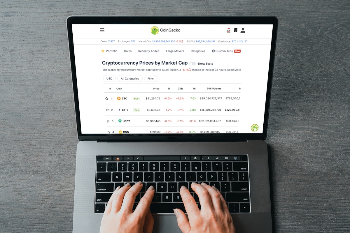 Service business owner analysing booking conversion rate data on a screen