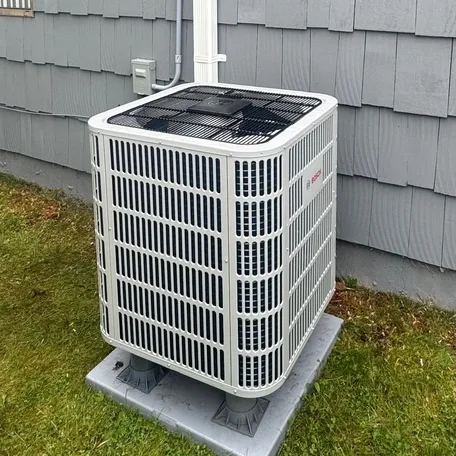 Central air conditioning condenser installed by Central Air Systems on Long Island