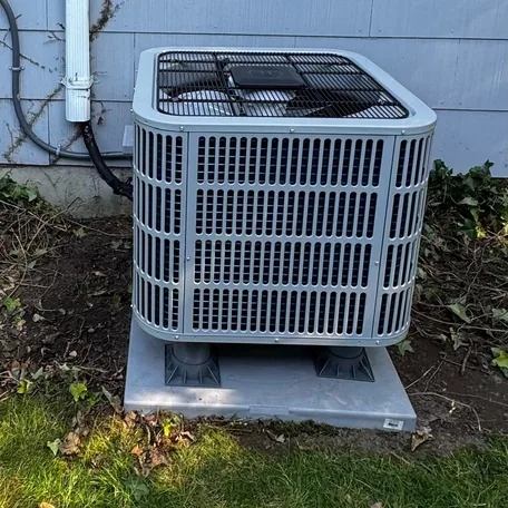 Central air conditioning condenser installed by Central Air Systems on Long Island