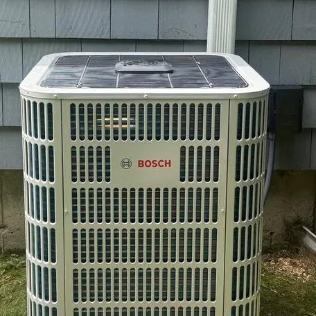 Central air conditioning condenser installed by Central Air Systems on Long Island