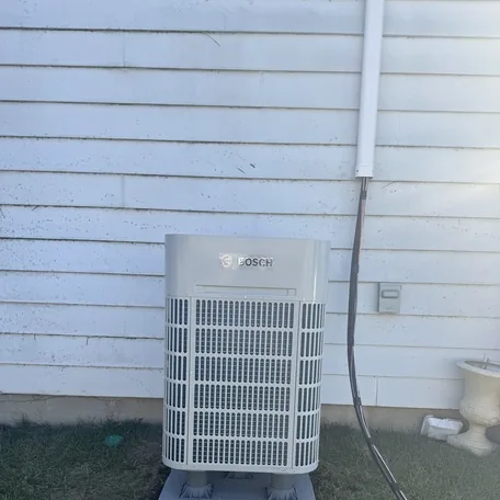 Central air conditioning condenser installed by Central Air Systems on Long Island