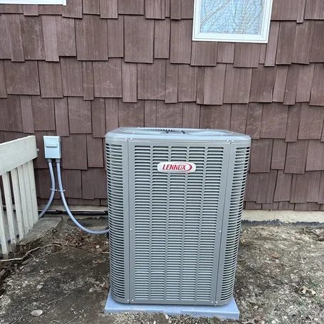 Central air conditioning condenser installed by Central Air Systems on Long Island