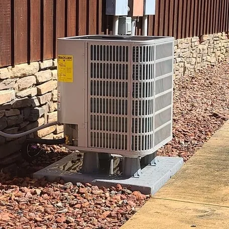 Central air conditioning condenser installed by Central Air Systems on Long Island