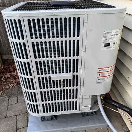 Central air conditioning condenser installed by Central Air Systems on Long Island