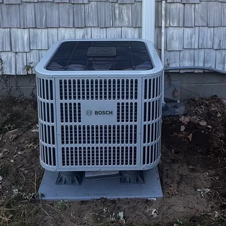 Central air conditioning condenser installed by Central Air Systems on Long Island