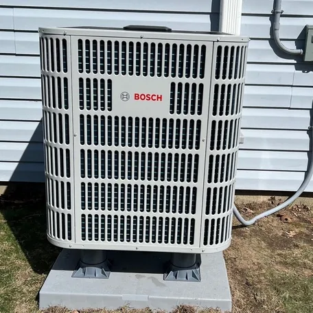 Central air conditioning condenser installed by Central Air Systems on Long Island