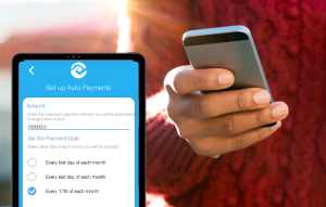 tenant auto-pay image: image of woman's hand holding a phone with a burgundy sweater on, overlayed is a screenshot of RentRedi's tenant auto-pay image in a phone frame