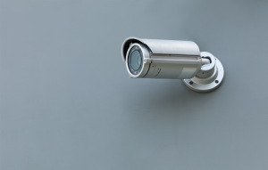 installing security cameras image: silver security camera attached to grey wall