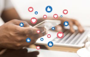 using social media on smartphone, design with LIKE icons