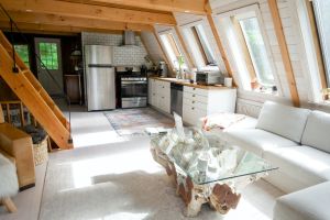 image of a sunlit living room: women of real estate and short term rentals image