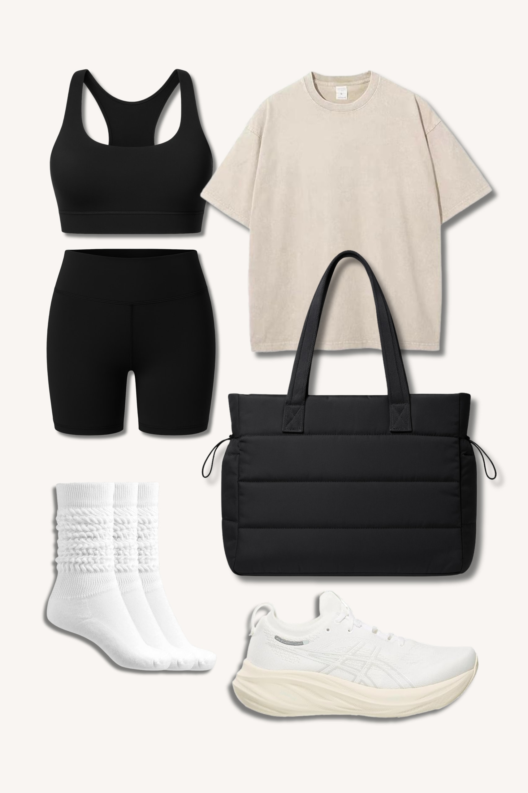 Woman in oversized cream tee and black biker shorts holding coffee cup on Parisian street