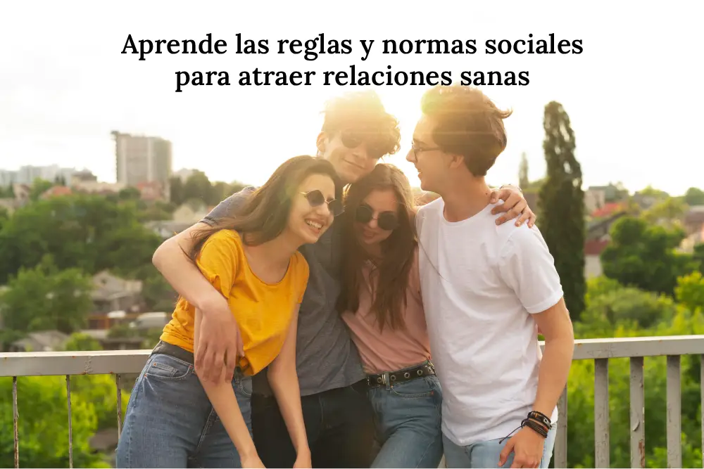 Grupo de amigos abrazados, simbolizando amistad, armonía y la importancia de comprender las reglas y normas sociales para atraer relaciones saludables